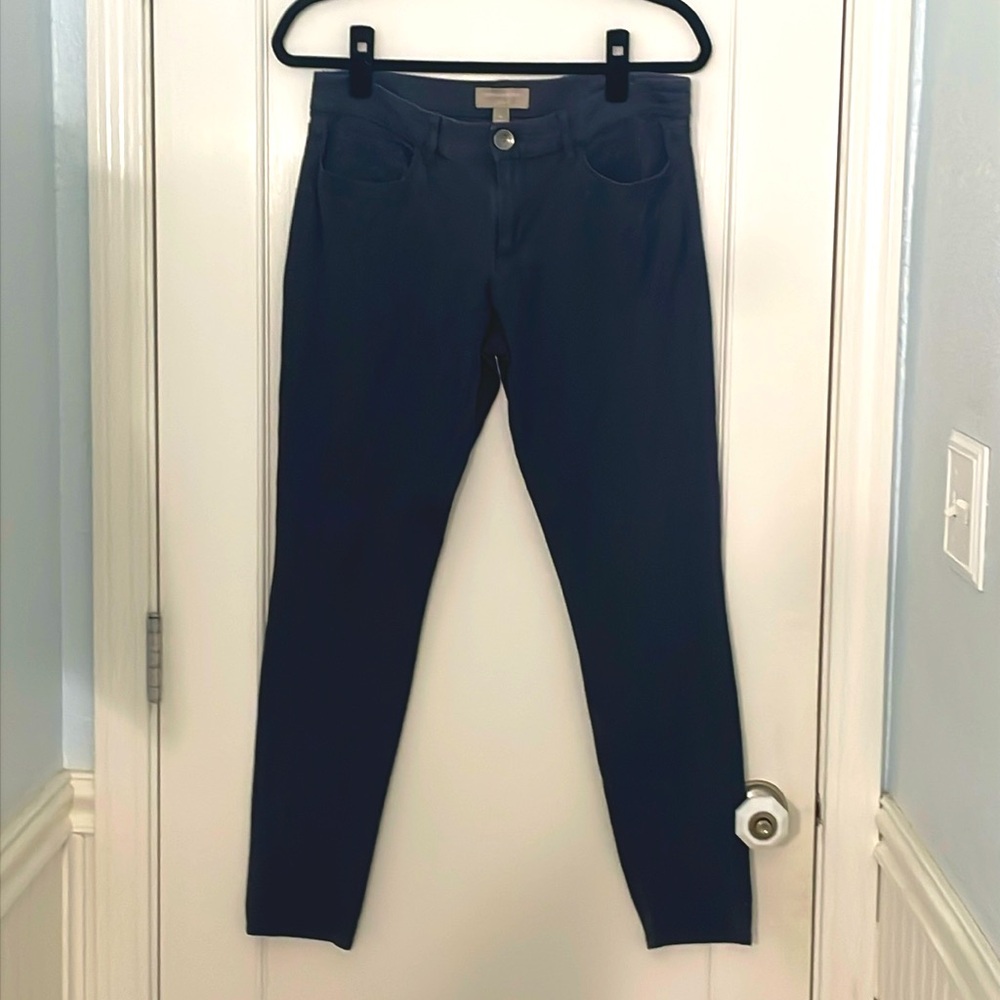 Grey, straight legged pants.